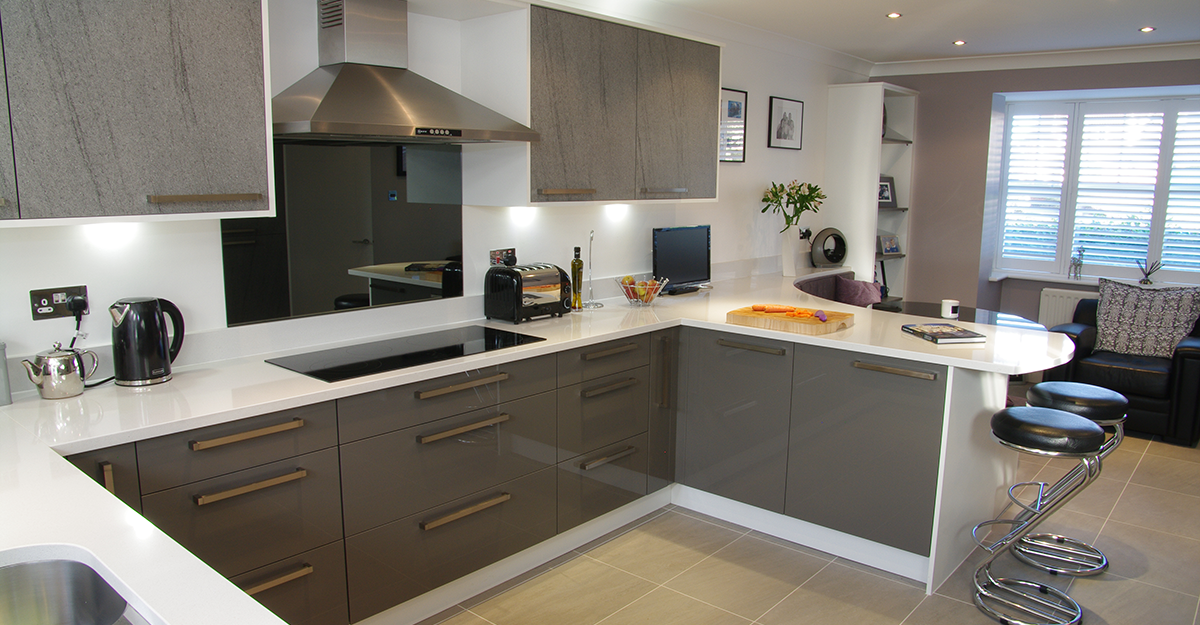 viynl wrapped dark grey and gloss kitchen